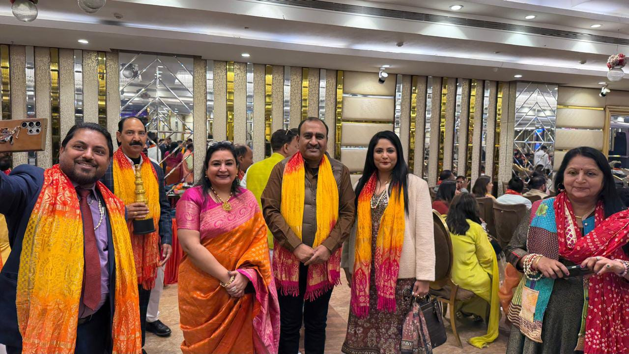 Neeru Aggarwal with fellow event attendees in a group photograph